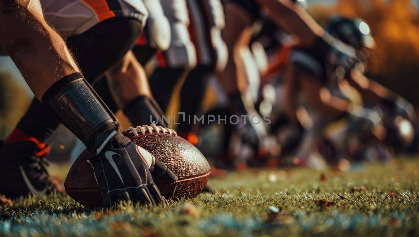 Closeup view of american football match with team are ready to hike the ball over the field.