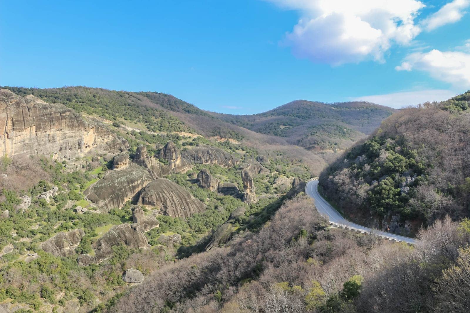 Embark on an unforgettable journey as you traverse the winding roads of Meteora, Greece, amidst a landscape of awe-inspiring beauty and spiritual significance