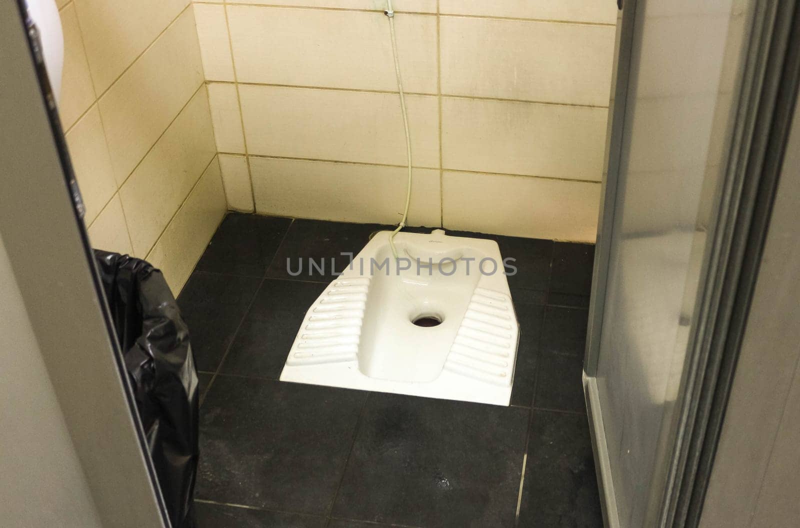 Embracing Tradition: The Simplicity of a Squat Toilet by DakotaBOldeman