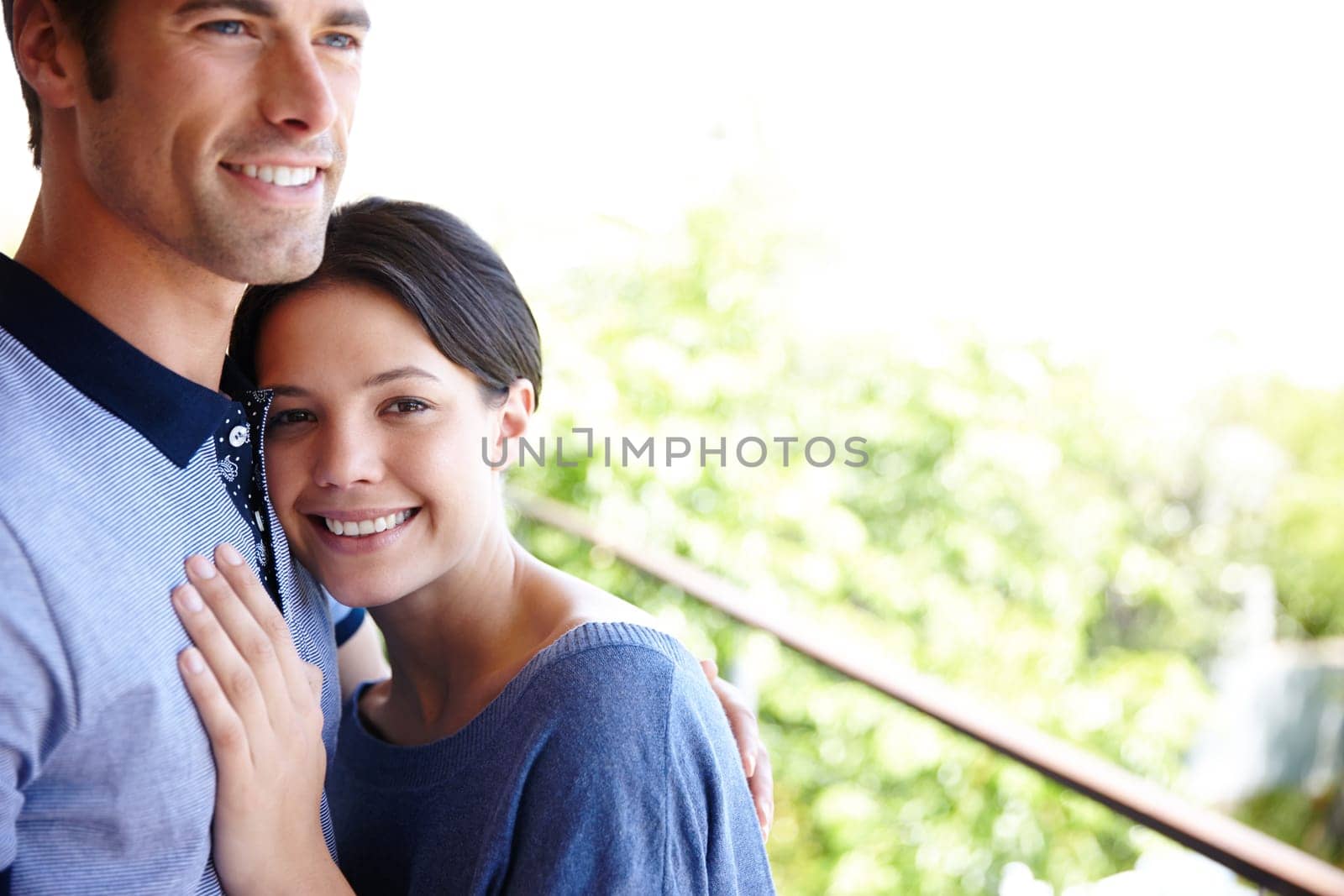 Couple, portrait and happy in hug, support and love for relationship, together and bonding. Woman, man and hugging with smile, romance and closeness in outdoors, holding and embracing for memories.