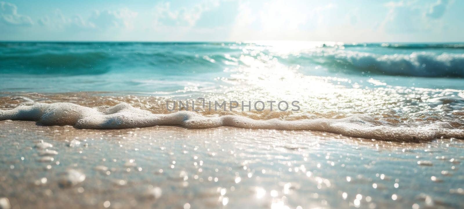 A serene seascape captures the gentle caress of waves on sunlit beach sand, a moment of calm embodied in nature's soft touch