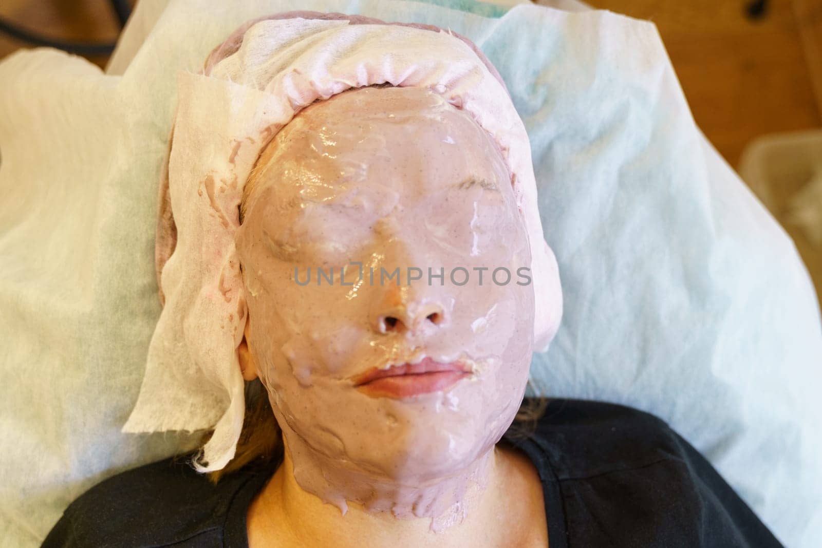 Woman Receiving Facial Mask Application by Sd28DimoN_1976