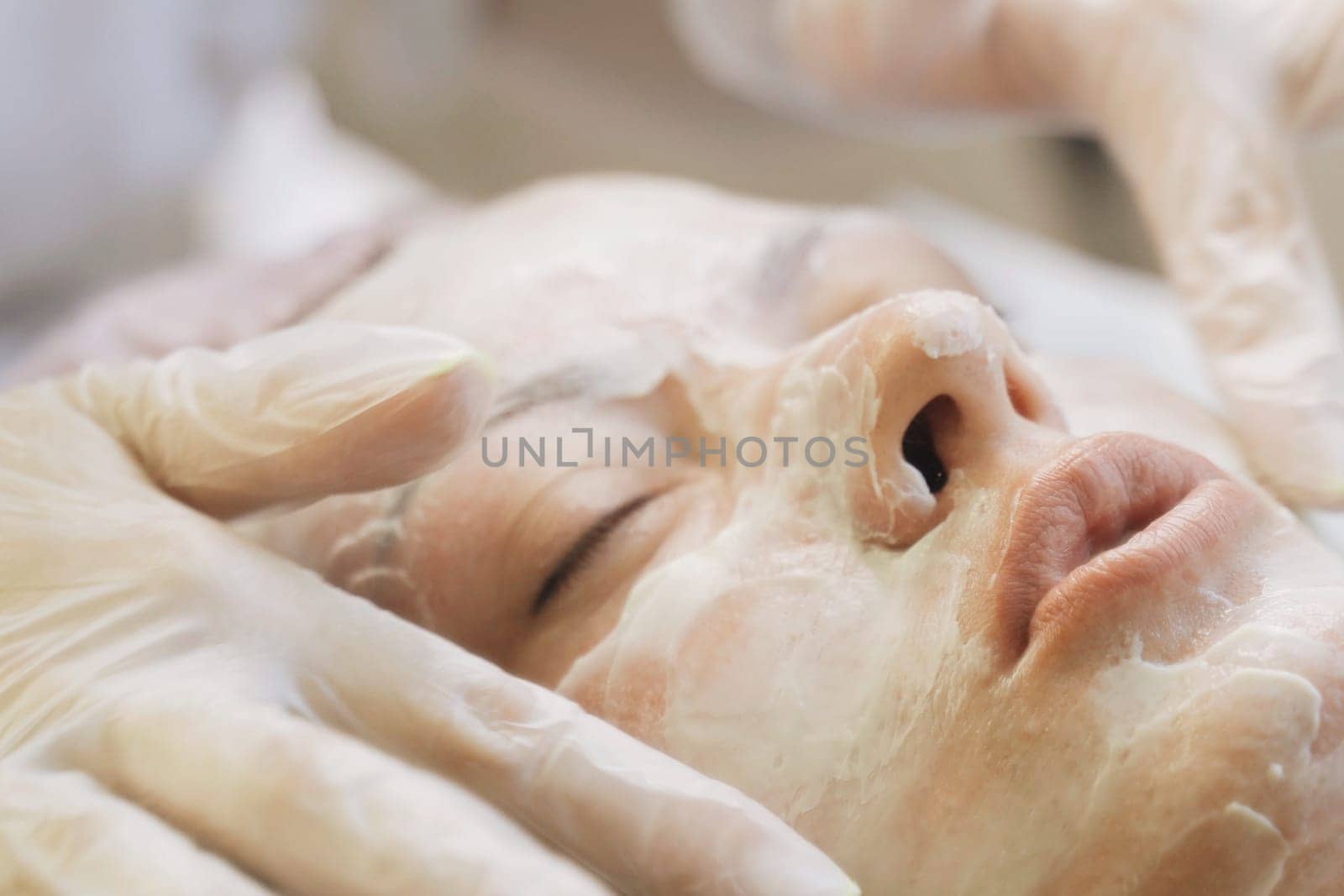 Woman Receiving Facial Massage. Close-up by Sd28DimoN_1976