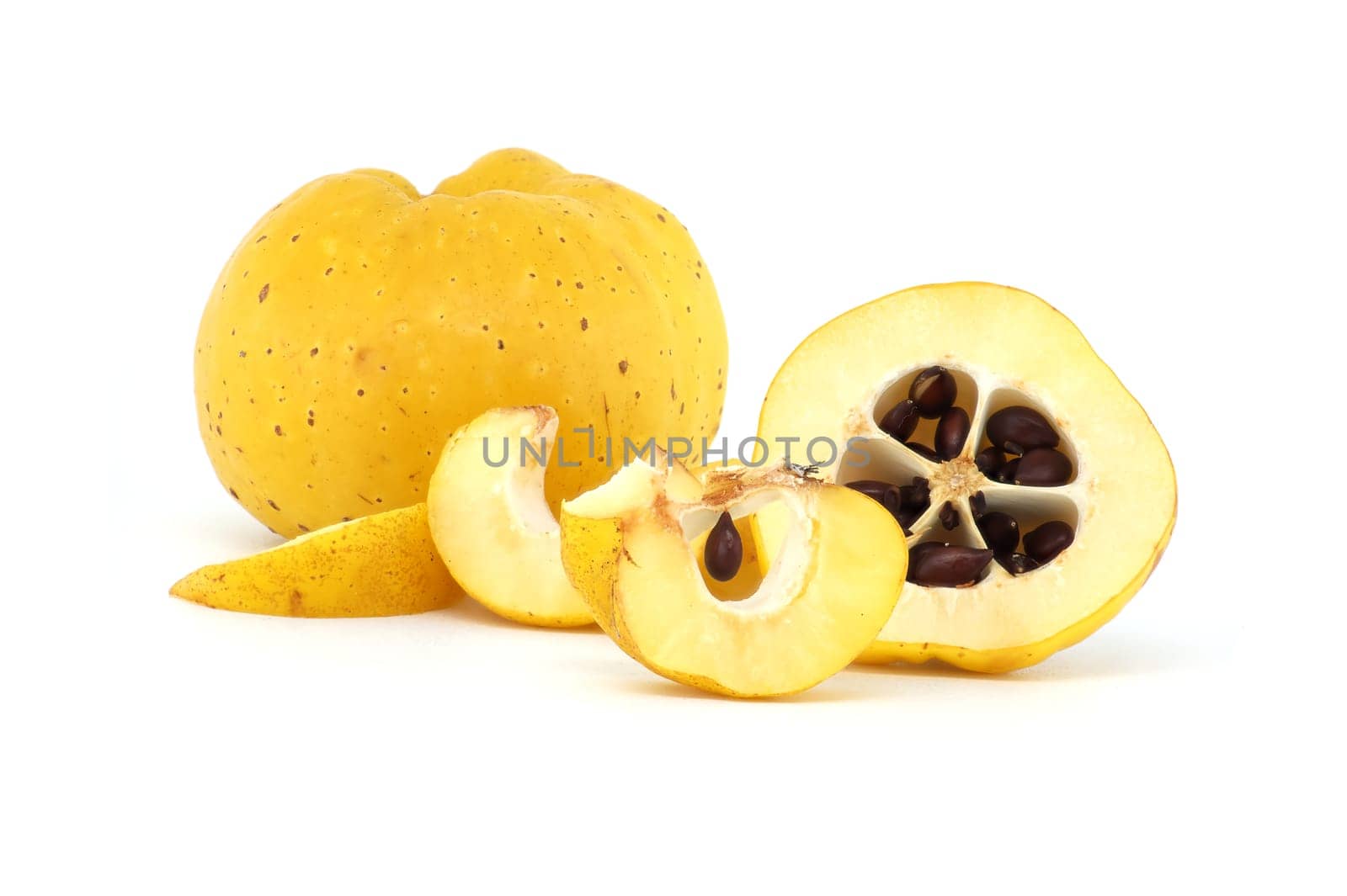 Vibrant quince fruits, both sliced and whole isolated on white background, full depth of field, Chaenomeles japonica or Japanese quince