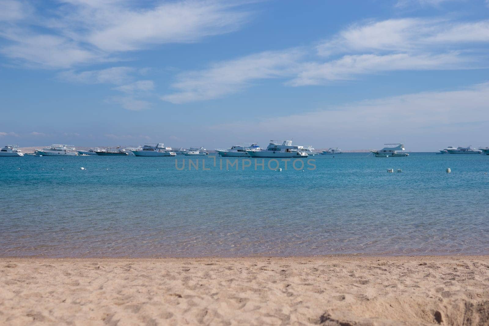 Beach Relaxation at the Red Sea. Fairy-tale Moments of a Sunny Day. The concept of tourism and sea travel.