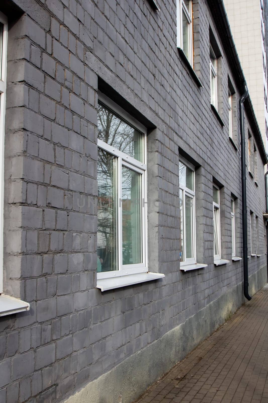 Windows on a modern two-storey building close up