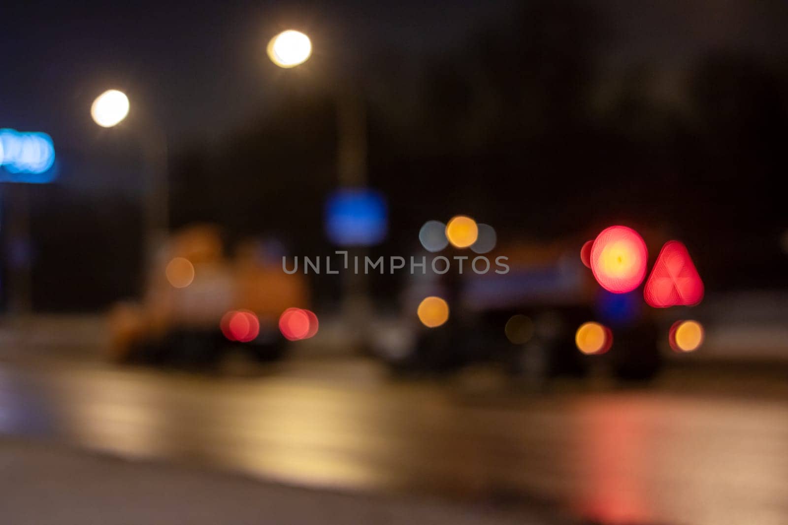 Bright red and yellow lights close up, blurred background