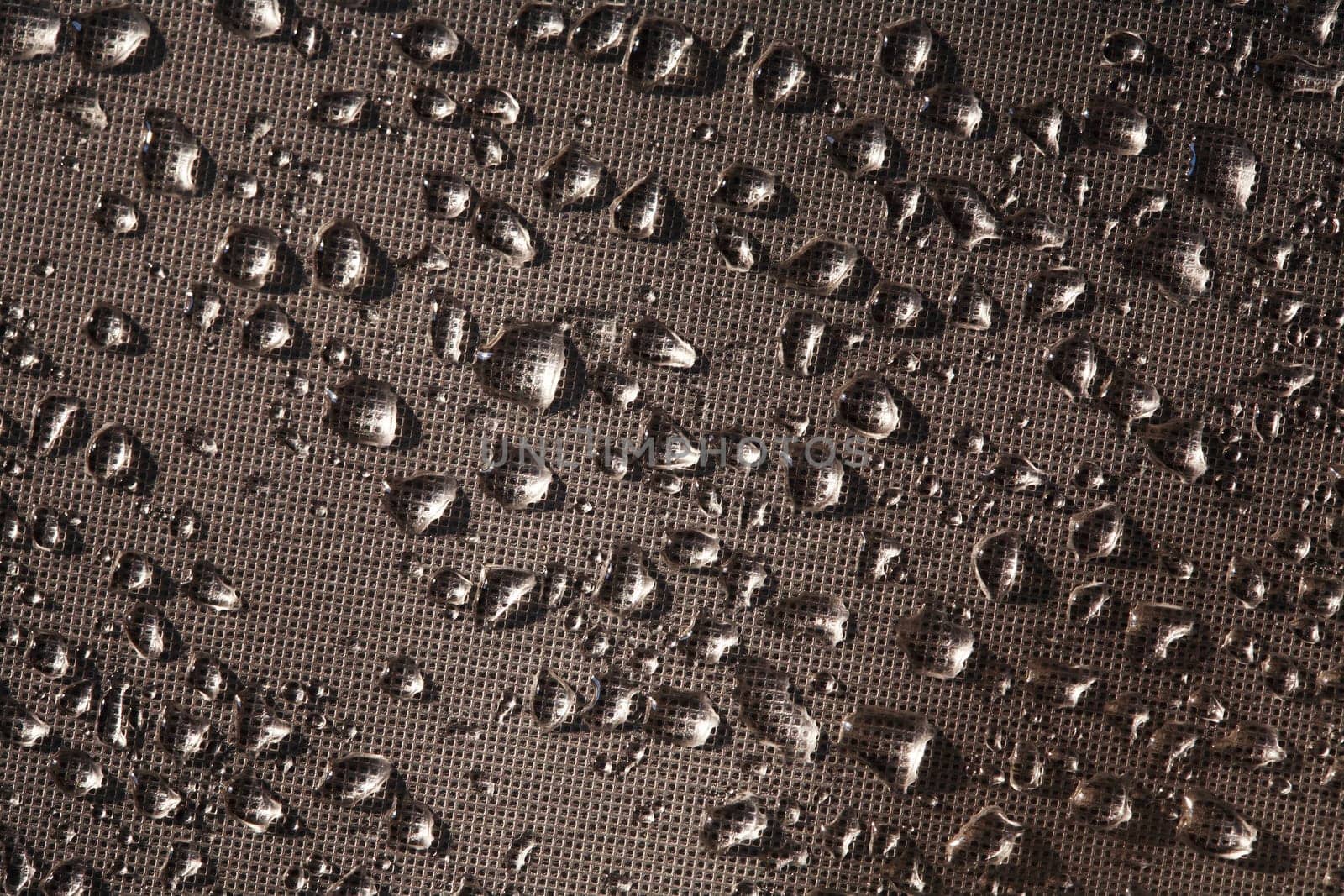 Abstract dark background with lot of water drops