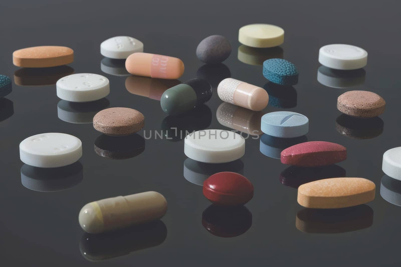 A close-up view of various pills, each with a distinct color and texture, arranged in a precise gradient, reflecting meticulous care and organization