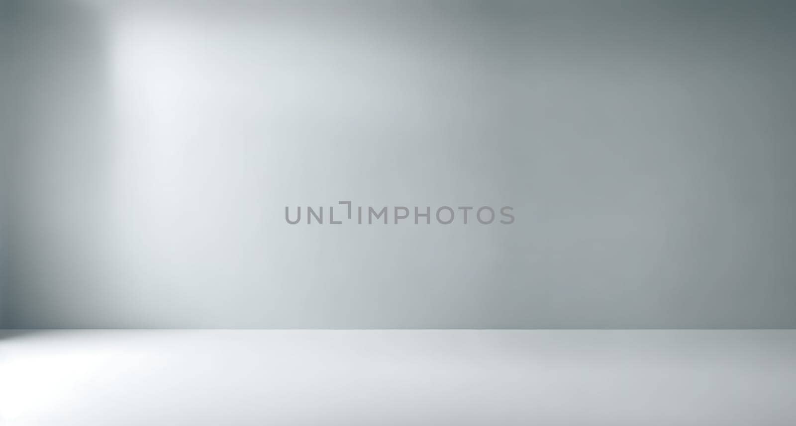 The image is a blank, empty room with white walls and a gray floor.