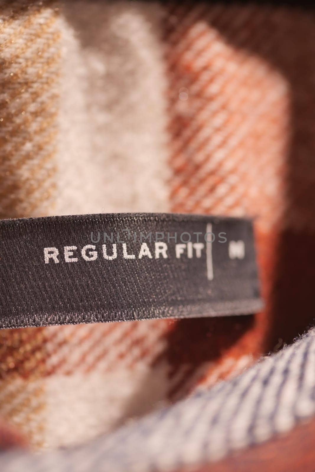 label tag regular fit on a men shirt ,