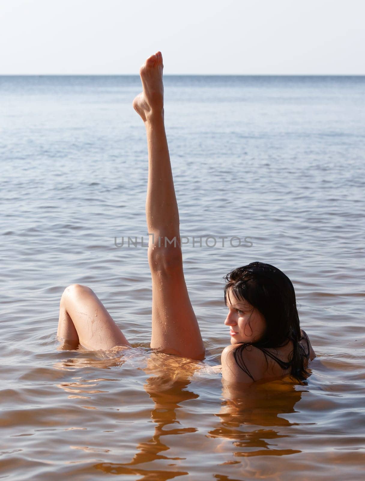 Young Beautiful Woman Posing Nude At The Seaside