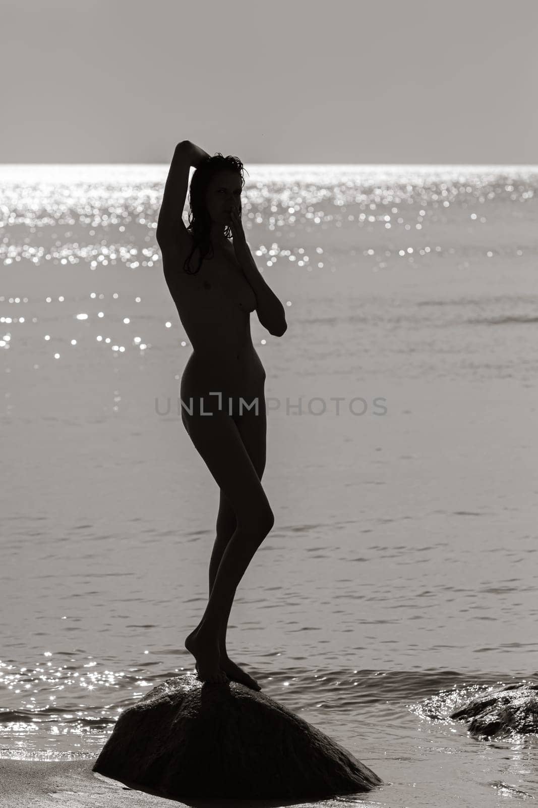 Young Beautiful Woman Posing Nude At The Seaside