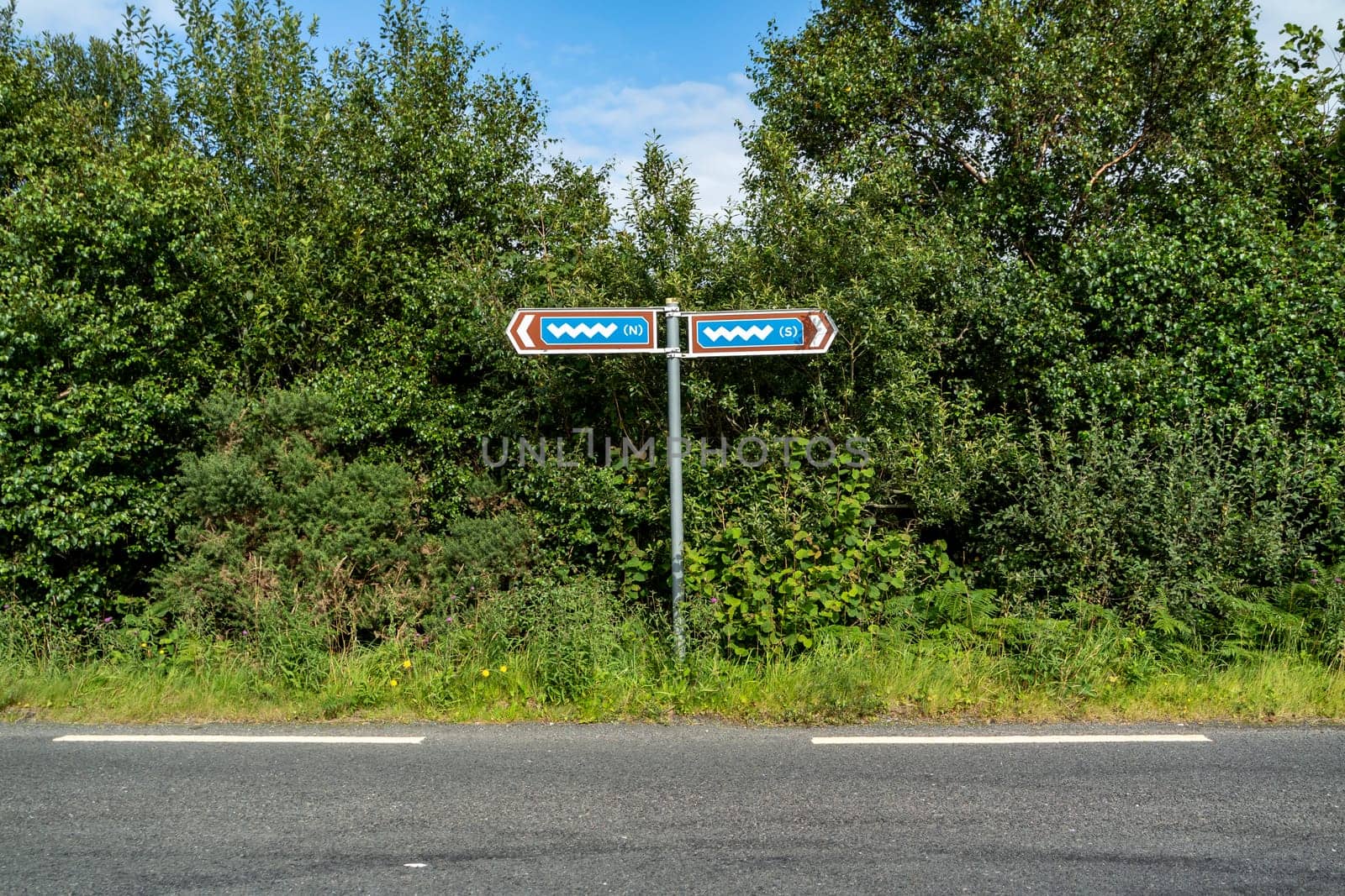 The sign points to a discovery point on the Wild Atlantic Way.