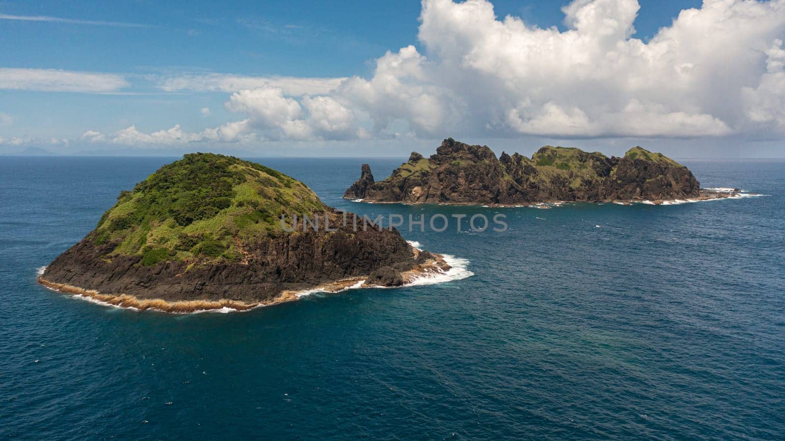 Tropical island and blue sea. Dos Hermanos Island. Santa Ana, Cagayan. Philippines.