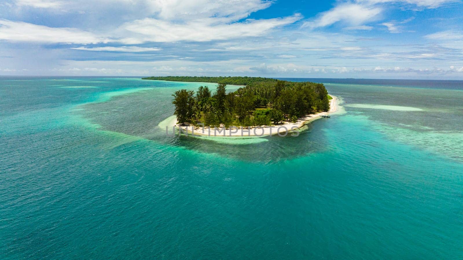 Aerial view of sandy beach on a tropical island. Canabungan Island, Balabac, Palawan. Philippines.