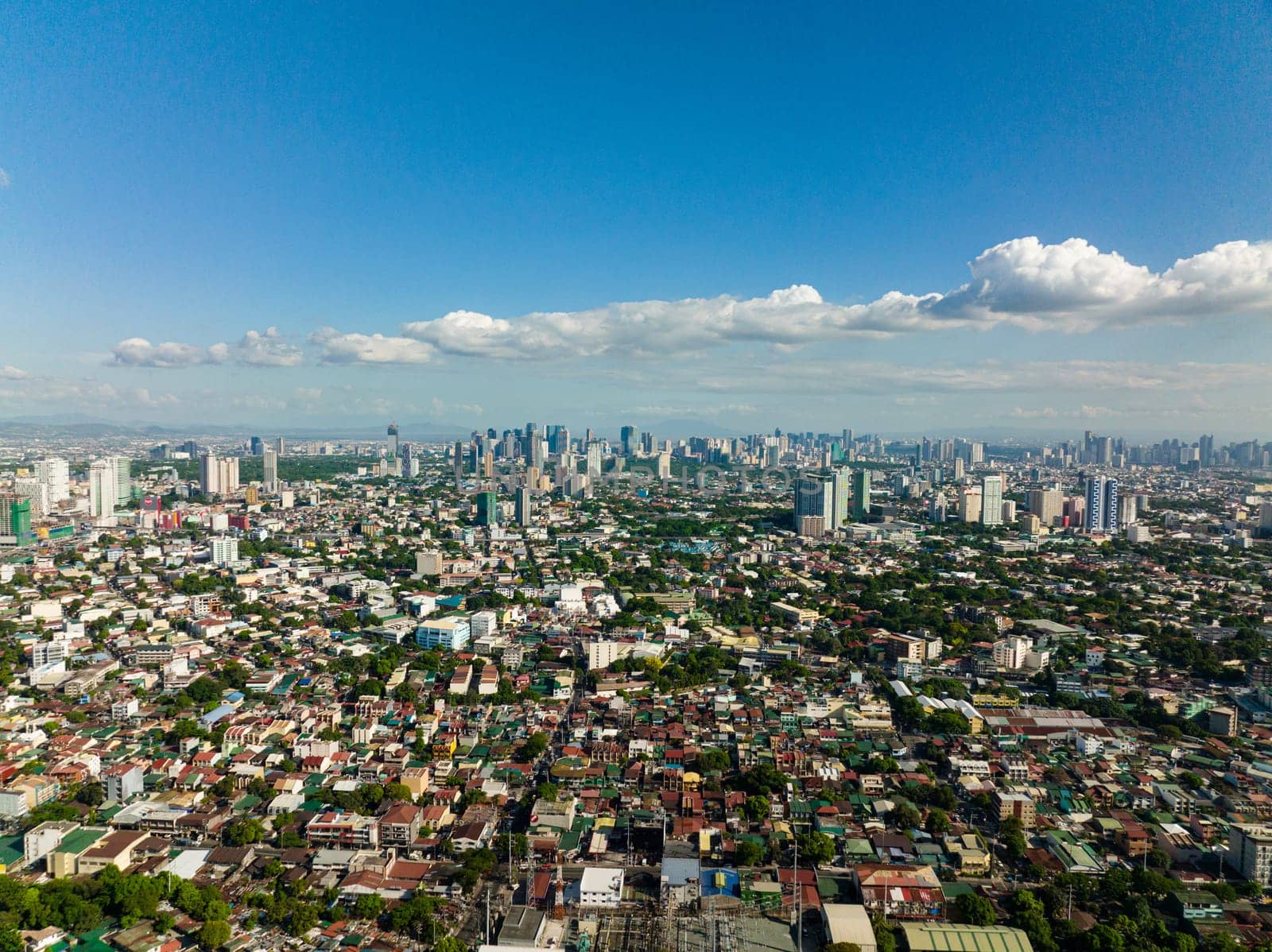 Manila is the capital of the Philippines with modern buildings and skyscrapers view from above. Philippines.