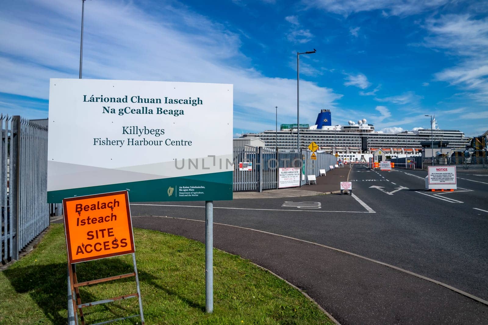 KILLYBEGS, IRELAND - MAY 16 2023: The sign at the roundabout is showing the way to the harbour.