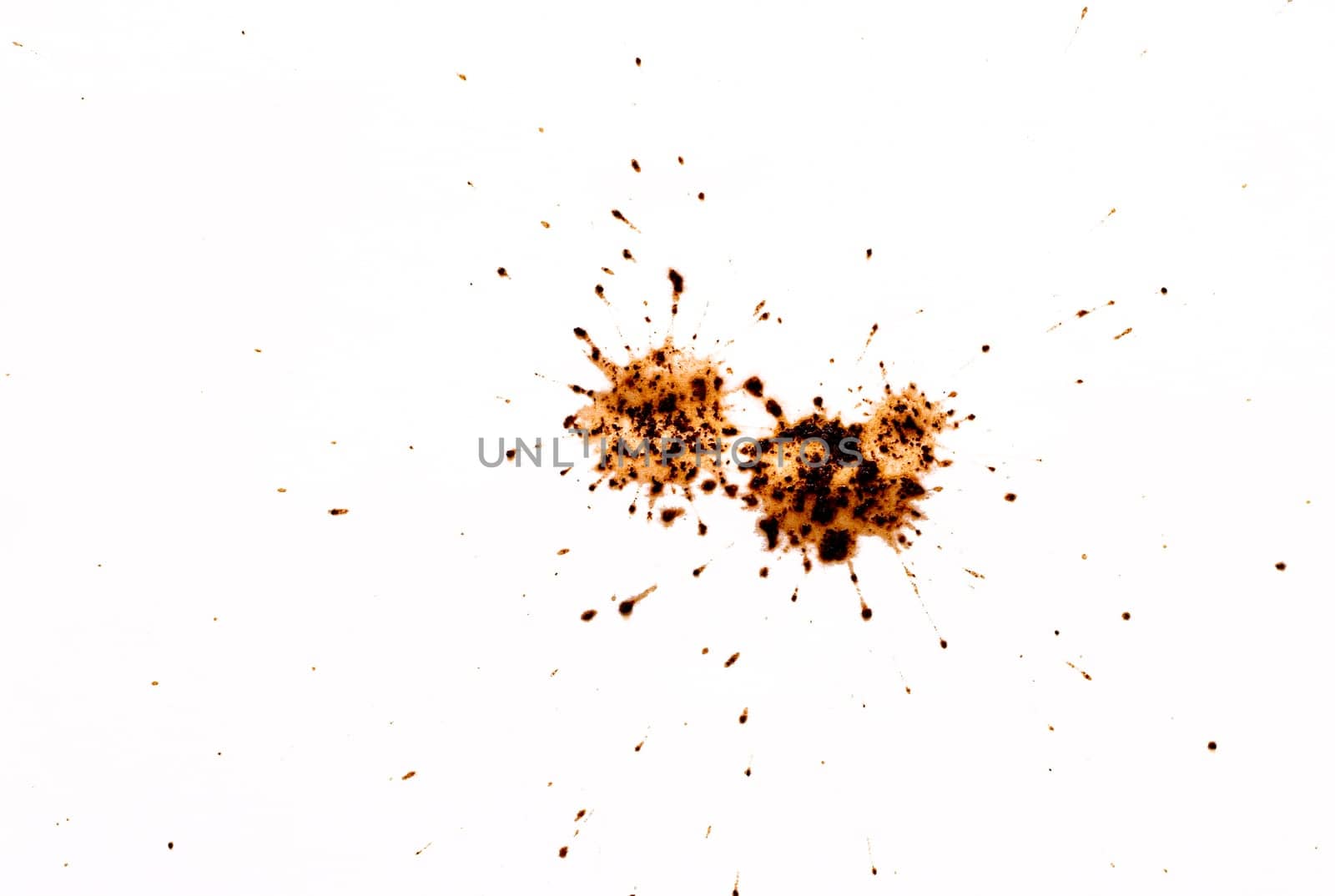 Coffee drops splashes with a brown color texture isolated on a white background by EdVal