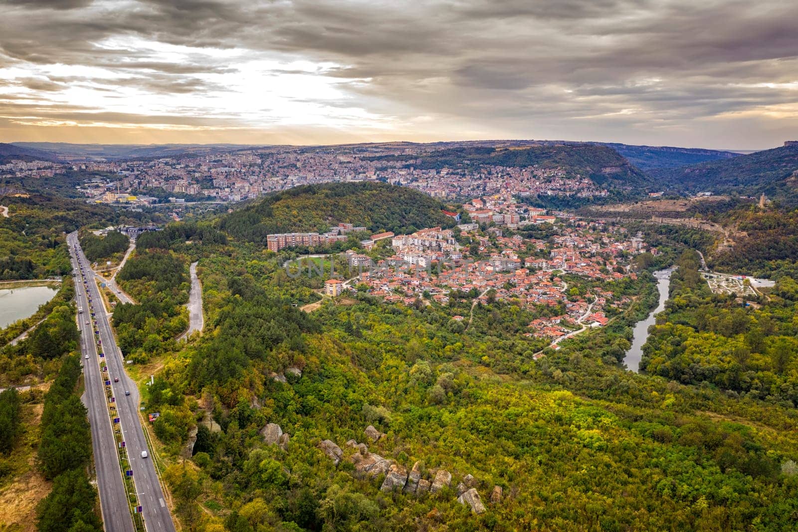 Aerial view from drone of the asphalt road and city Veliko Tarnovo, Bulgaria