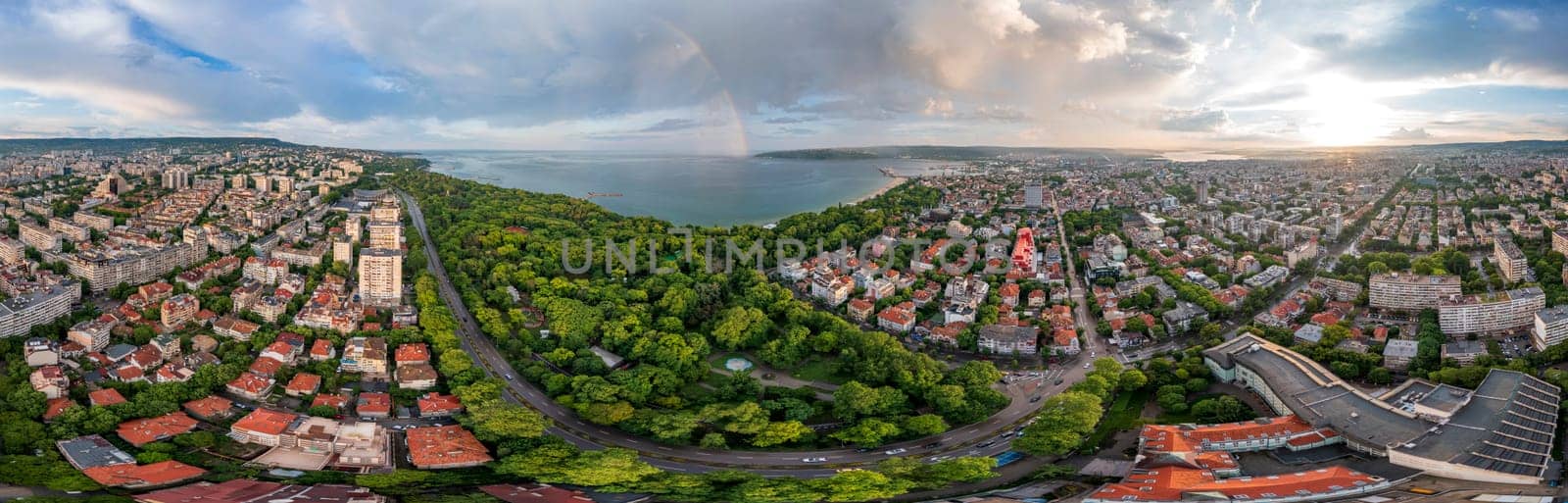 Stunning panorama of the city and rainbow over the sea  by EdVal