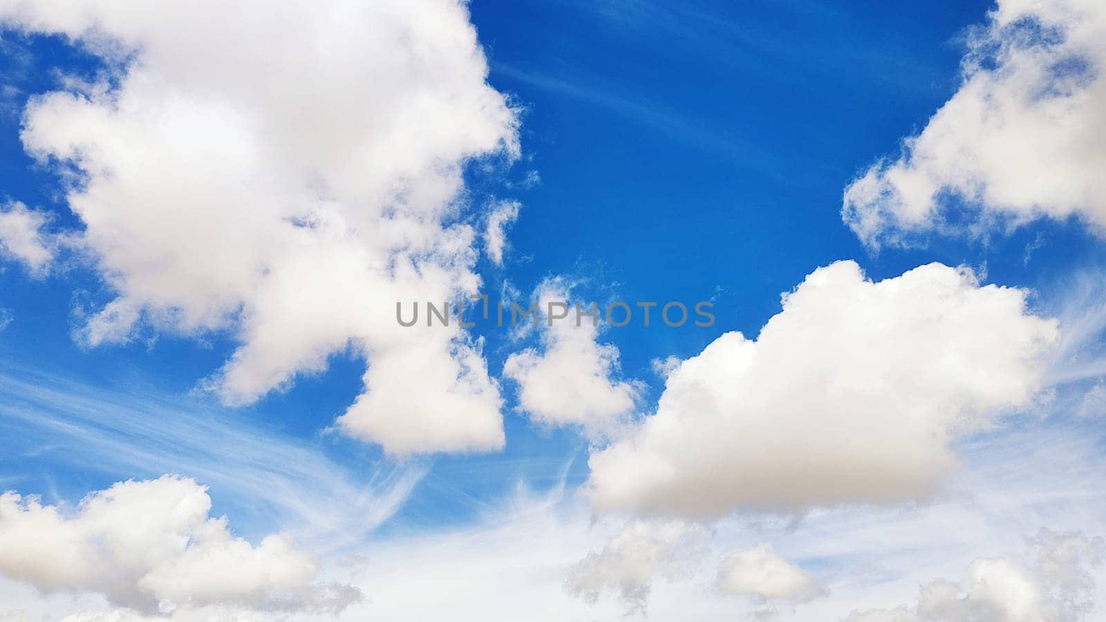 Blue light sky nature white clouds whether background . High quality photo