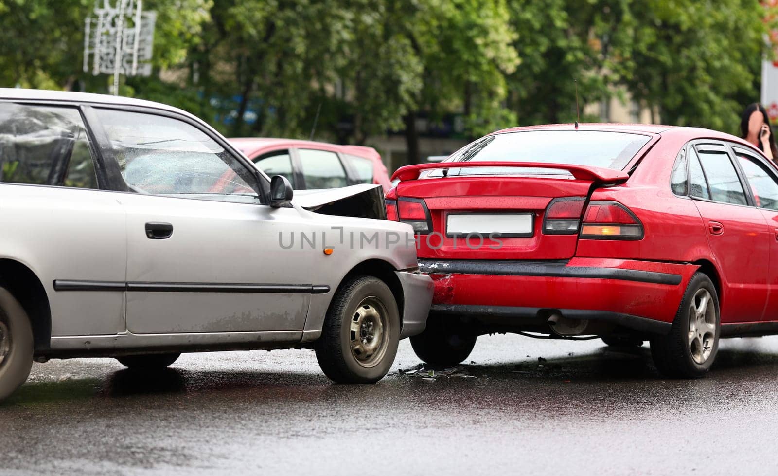 Accident of red and silver car after rain damage failure to keep distance safe distance