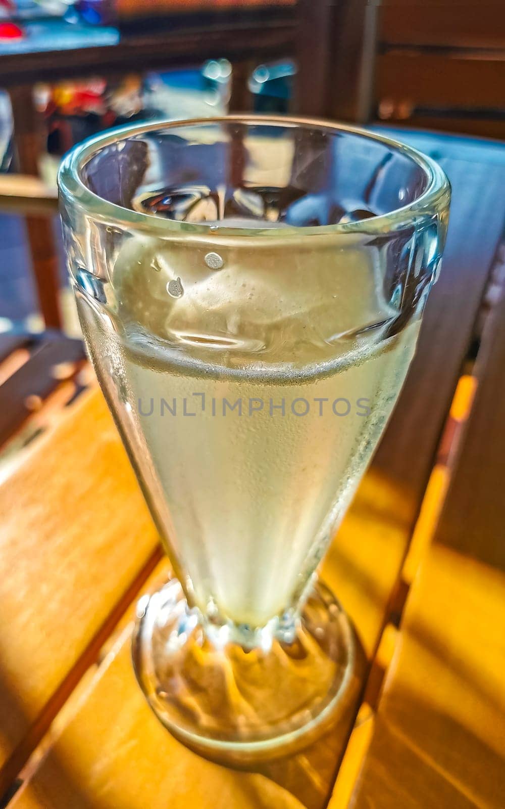 Glass with lime mint and ginger juice in Zicatela Puerto Escondido Oaxaca Mexico.