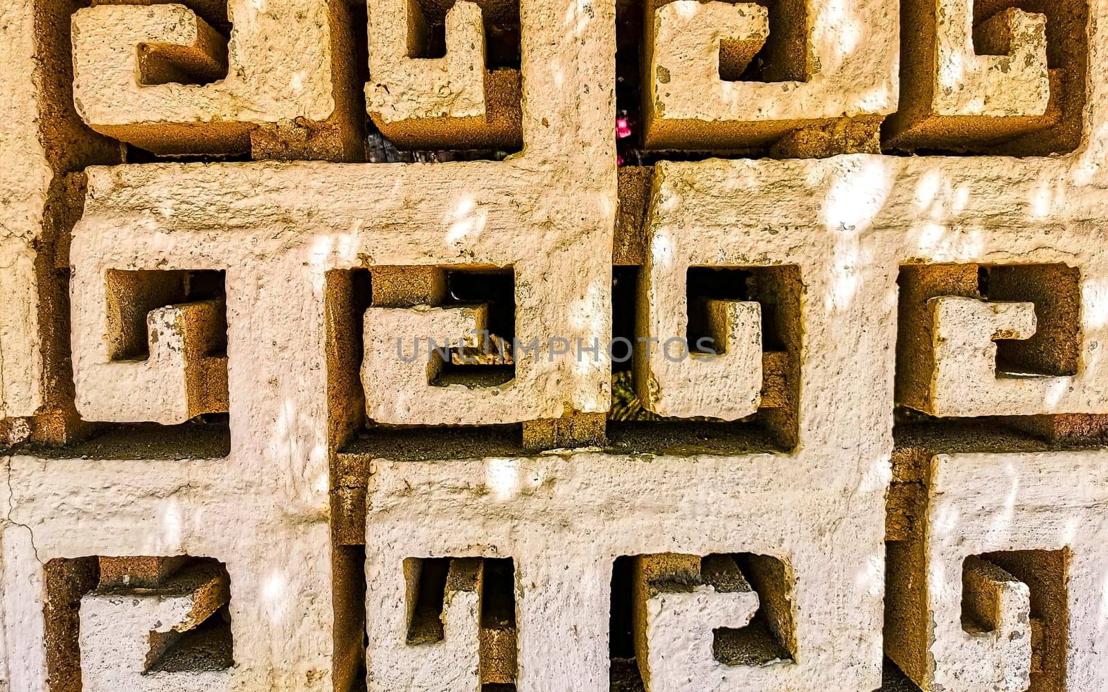 Texture pattern detail of a wall of rocks stones brick bricks brickwall marble art in Zicatela Puerto Escondido Oaxaca Mexico.