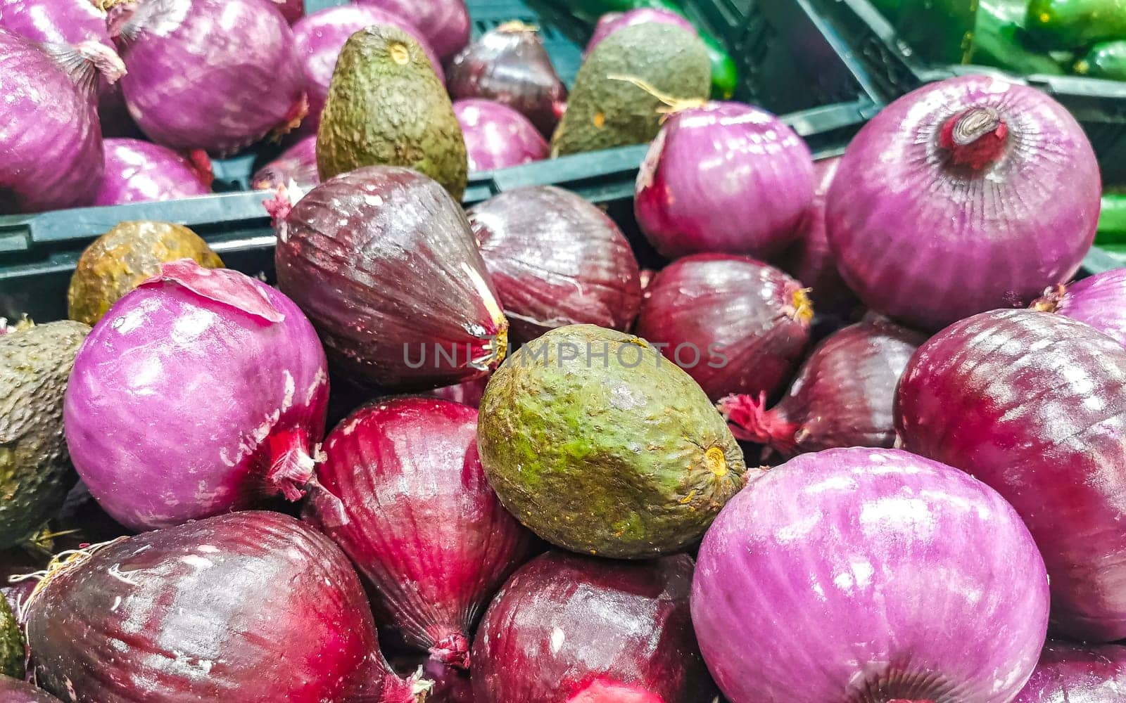 Onions onion red purple and white vegetables on the market in Zicatela Puerto Escondido Oaxaca Mexico.