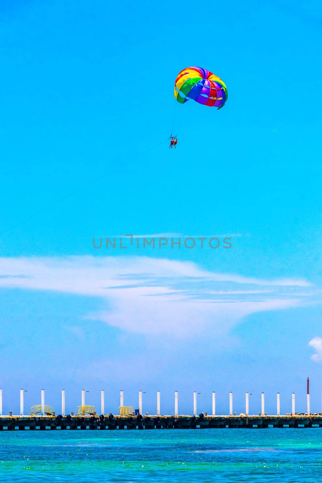 Paragliding with boat in the Caribbean in Playa del Carmen Quintana Roo Mexico.