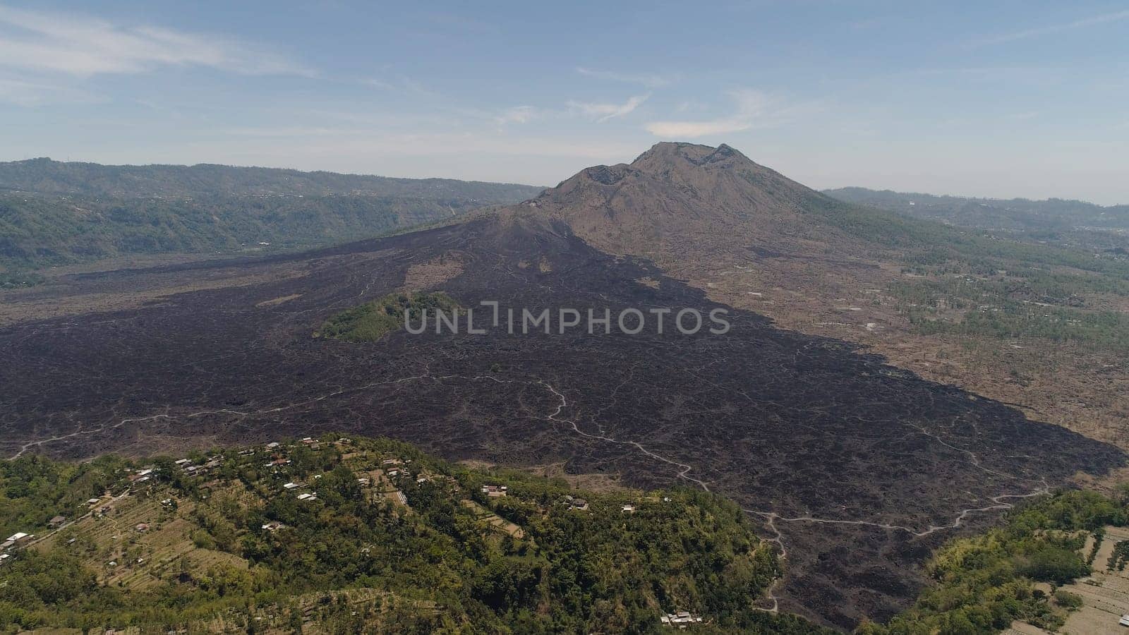 Aerial view landscape after volcanic eruption volcano Batur mountain landscape with volcano sky and clouds Bali, Indonesia. Travel concept.