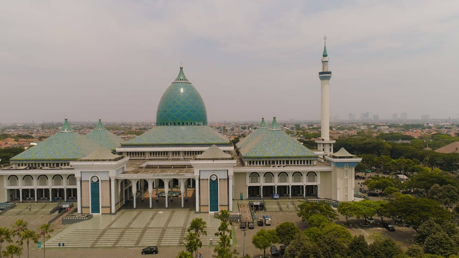 aerial view mosque in Indonesia Al Akbar in Surabaya, Indonesia. beautiful mosque with minarets on island Java Indonesia. mosque in an asian city