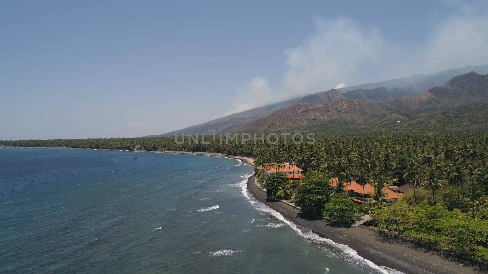 aerial seascape luxury hotel on beach background mountainss in tropical resort. Bali,Indonesia, travel concept.