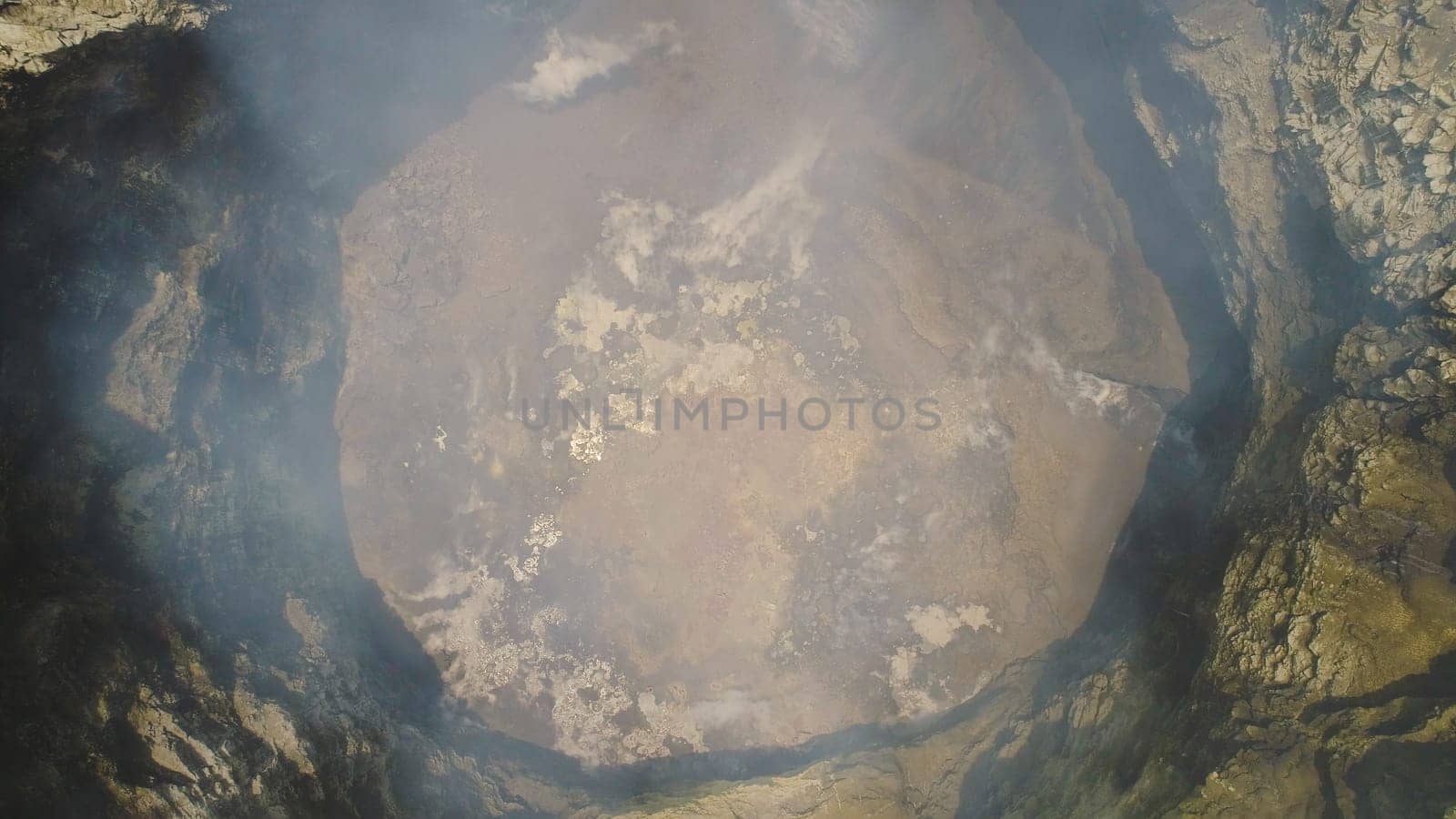 smoking crater active volcano Bromo. aerial view mountain landscape volcano crater and mountains Tengger Semeru national park Java, Indonesia.