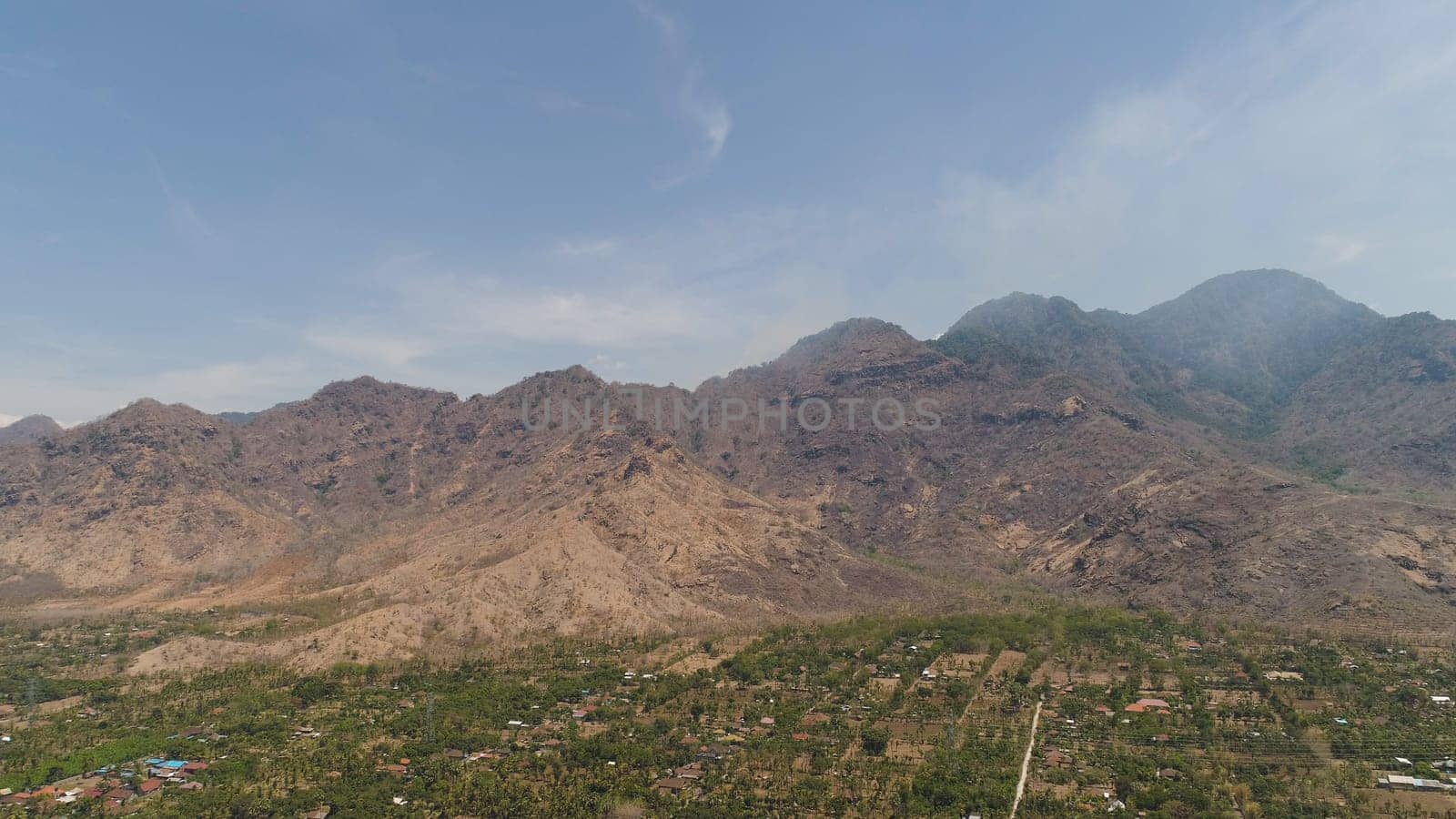 mountain landscape small town at the foot mountains. aerial view mountain with city.