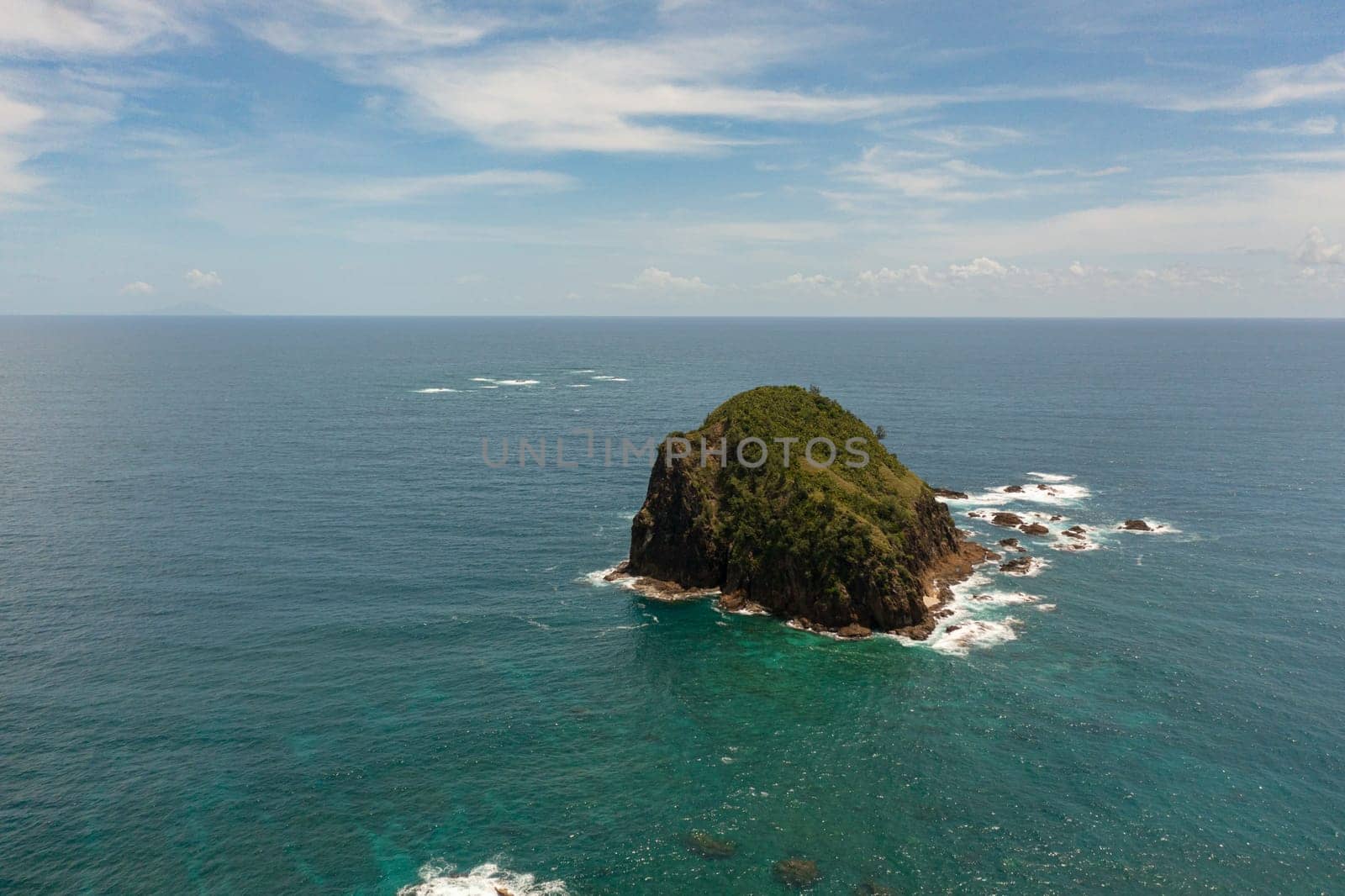 Aerial view of small island and blue sea. Santa Ana, Cagayan. Philippines.