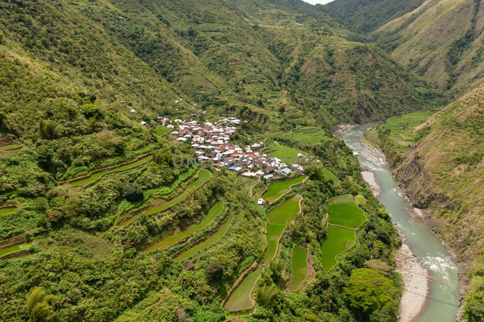 Mountains and rice fields against the blue sky. Philippines, Luzon.