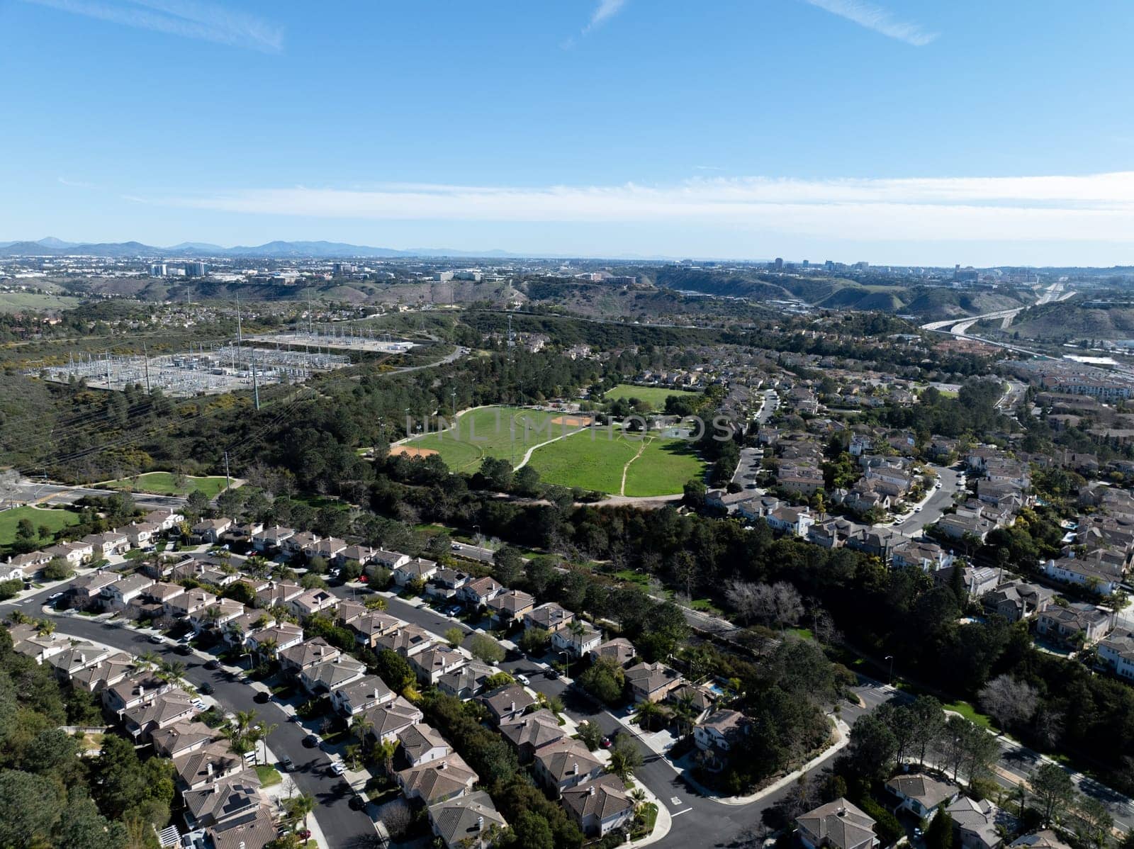 Aerial view of middle class subdivision neighborhood with residential houses in San Diego, California, USA. by Bonandbon