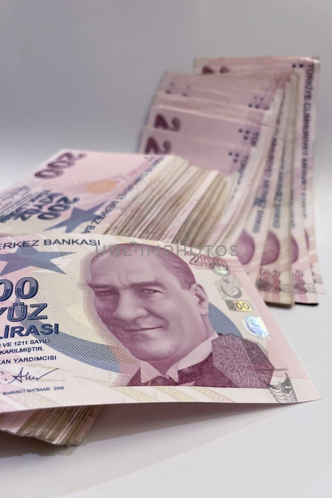 200 Turkish lira banknotes. Close-up. Financial concept. by yilmazsavaskandag