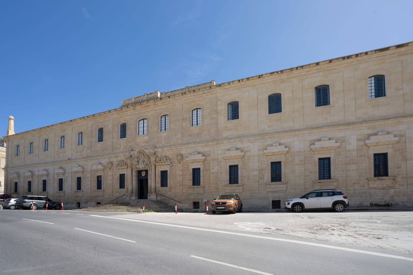 Valletta, Malta, April 03, 2024. Exterior view of the The maltese Archbishop's Curia in the city center
