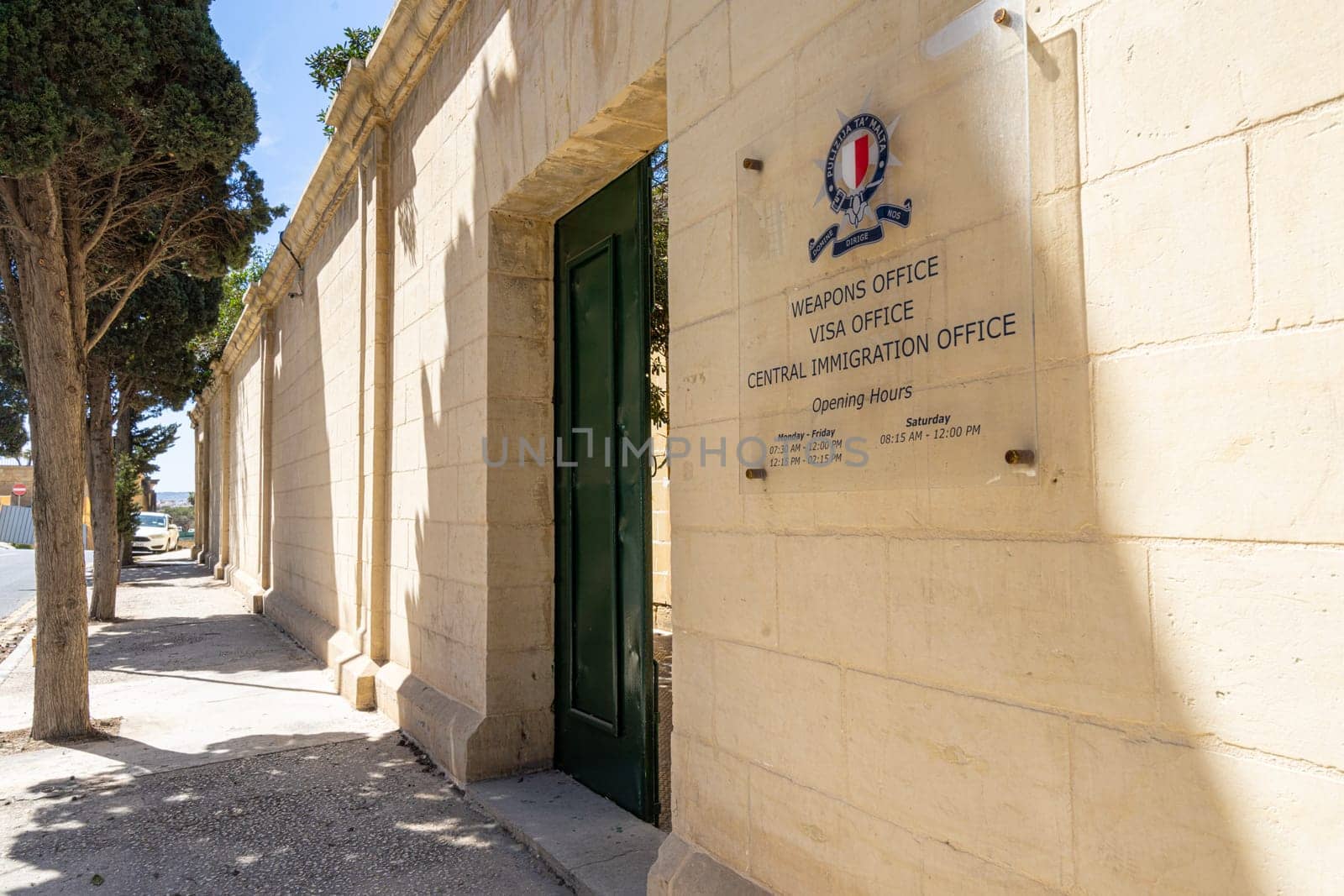 Valletta, Malta, April 03, 2024. the Sir Hannibal. the sign of the  Central Immigration Office in the city center