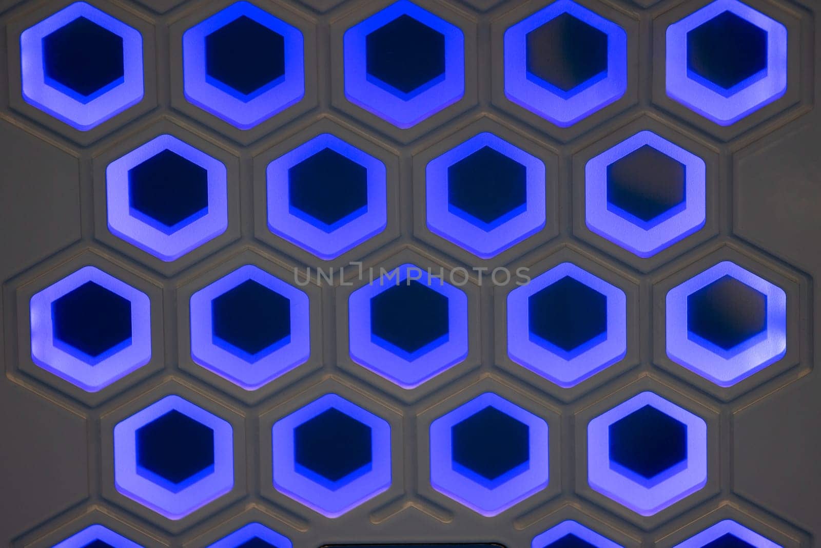 neon abstract honeycombs on the wall, new generation technology