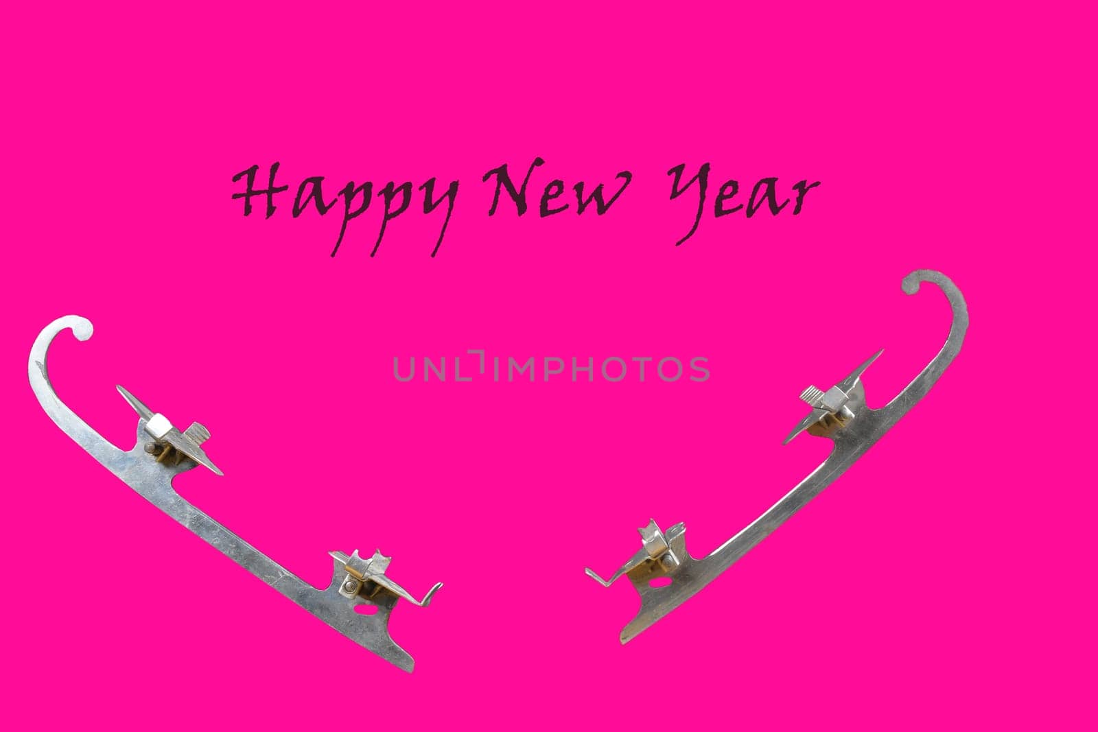 Vintage ice-skate on pink background. Text - Happy New Year. Copy space.