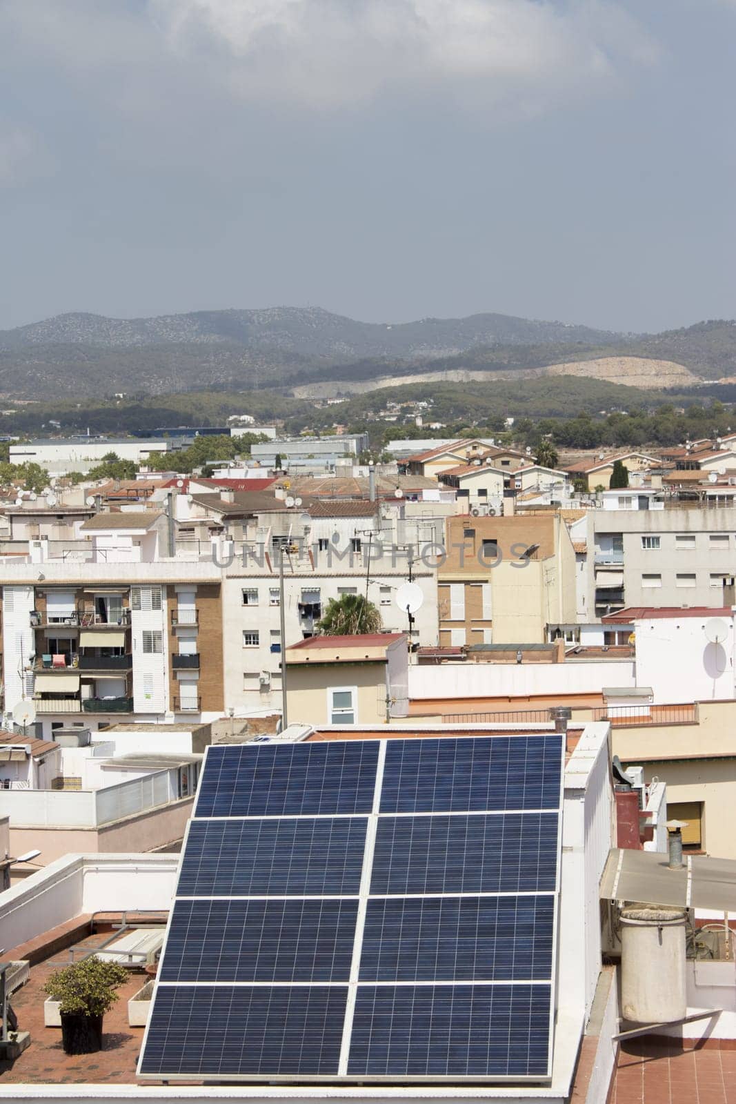 Solar panels placed on the roof of a building. Out of doors