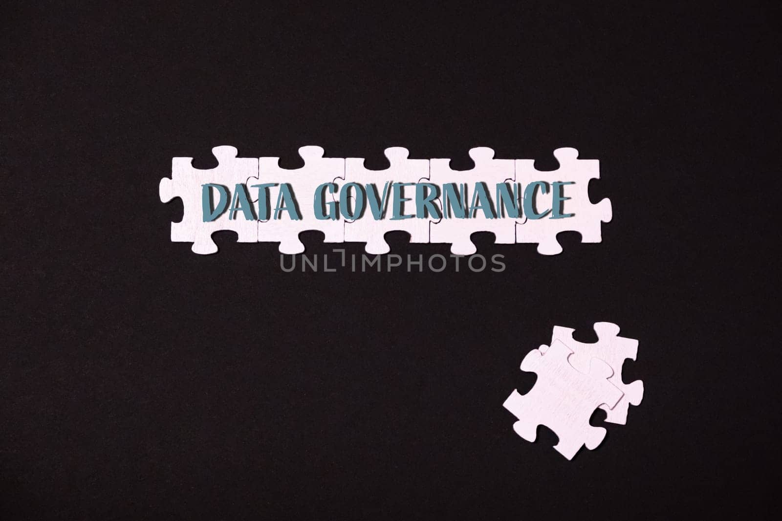 A jigsaw puzzle with the words Data Governance written on it by Alla_Morozova93