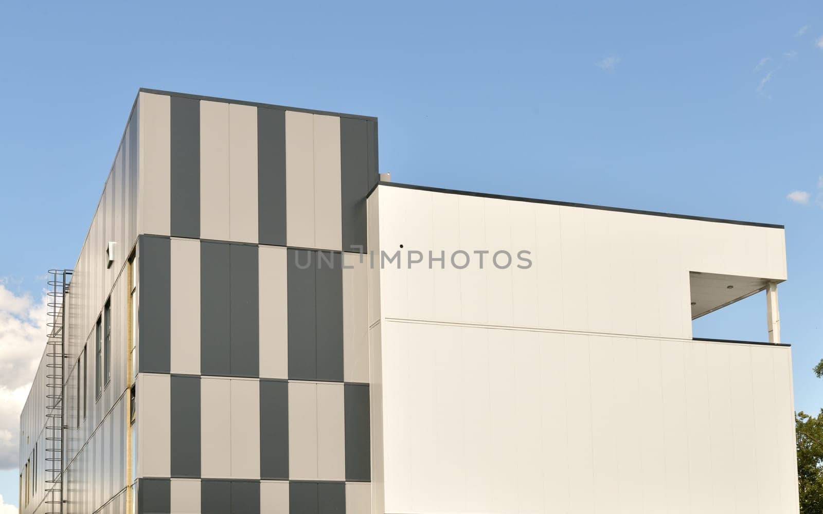 Fragment of a building with walls made of a sandwich panels