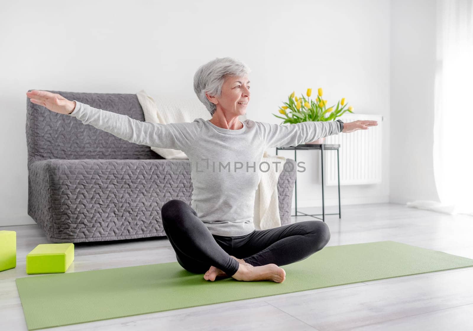 Calm Exercises At Home In A Bright Room by tan4ikk1