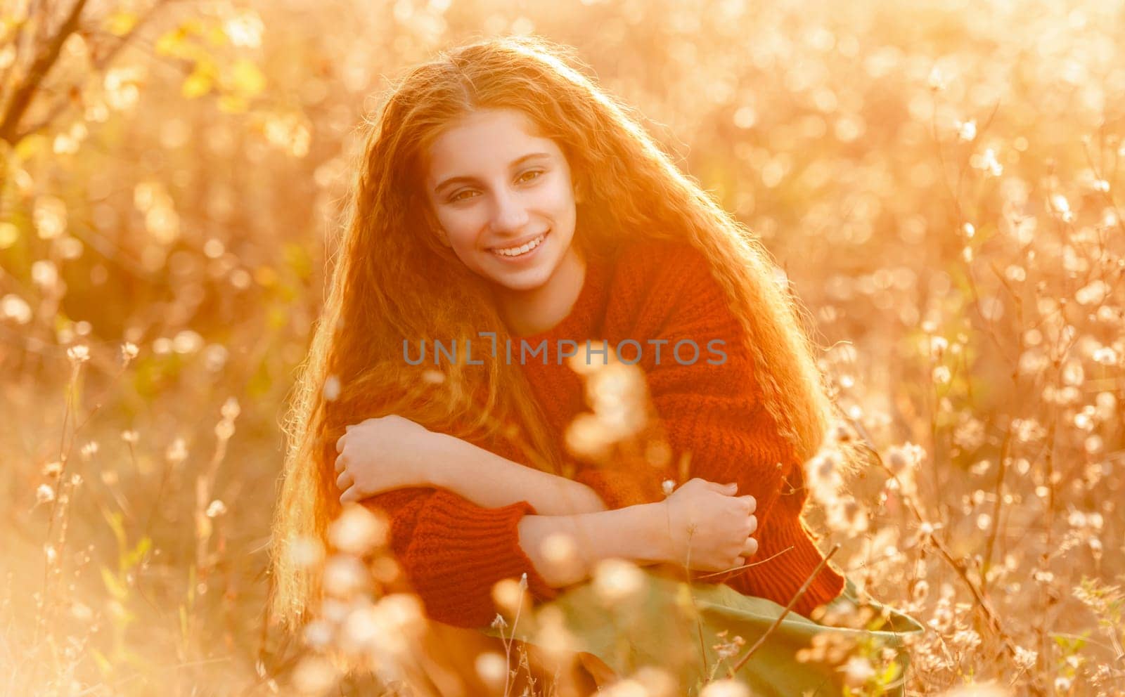 Happy teenage girl walking in autumn nature by tan4ikk1