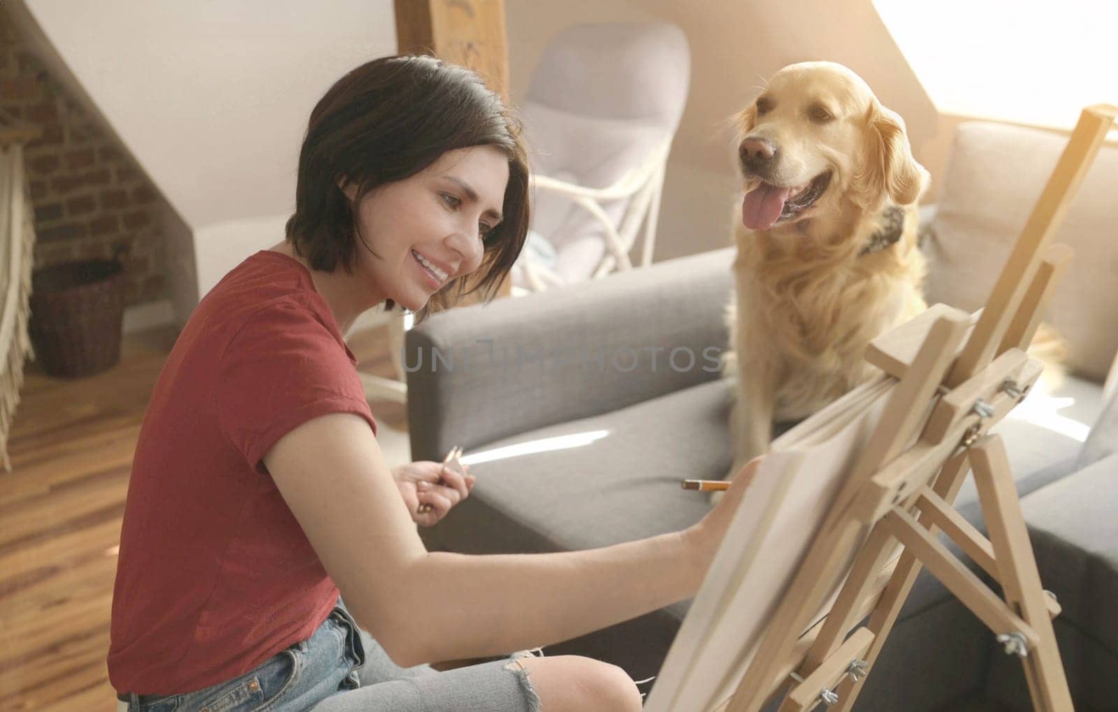 Pretty girl artist drawing sketch with golden retriever dog by tan4ikk1